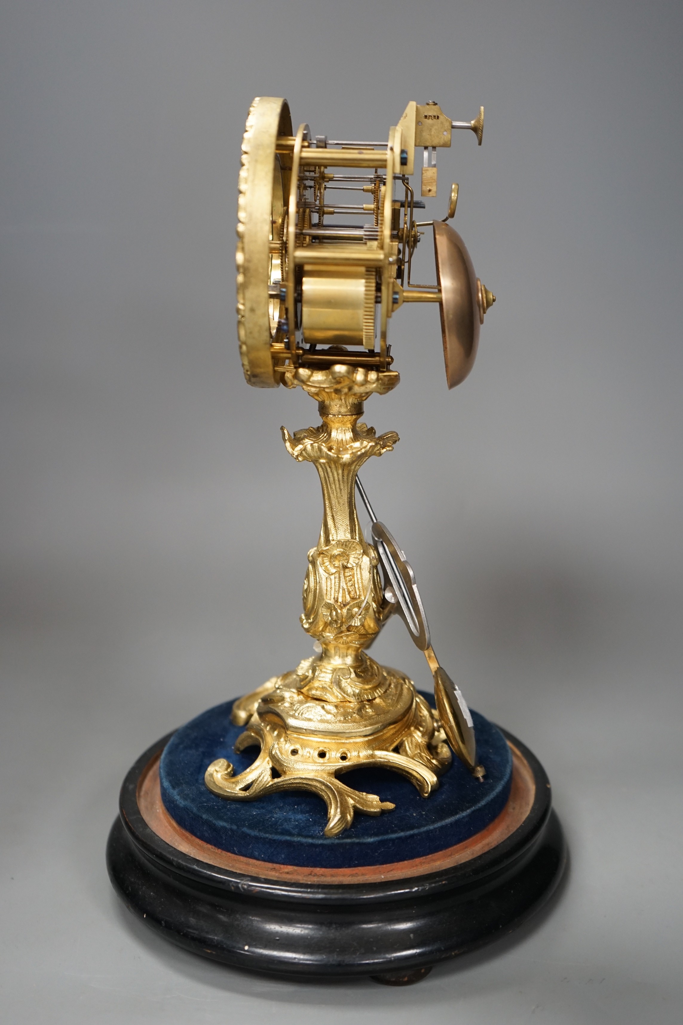 A French Grignon-Meusnier of Paris ormolu clock under dome, with key and pendulum